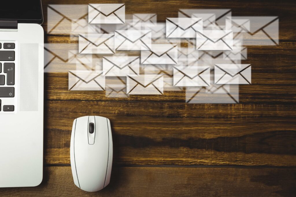 Wooden desk and emails